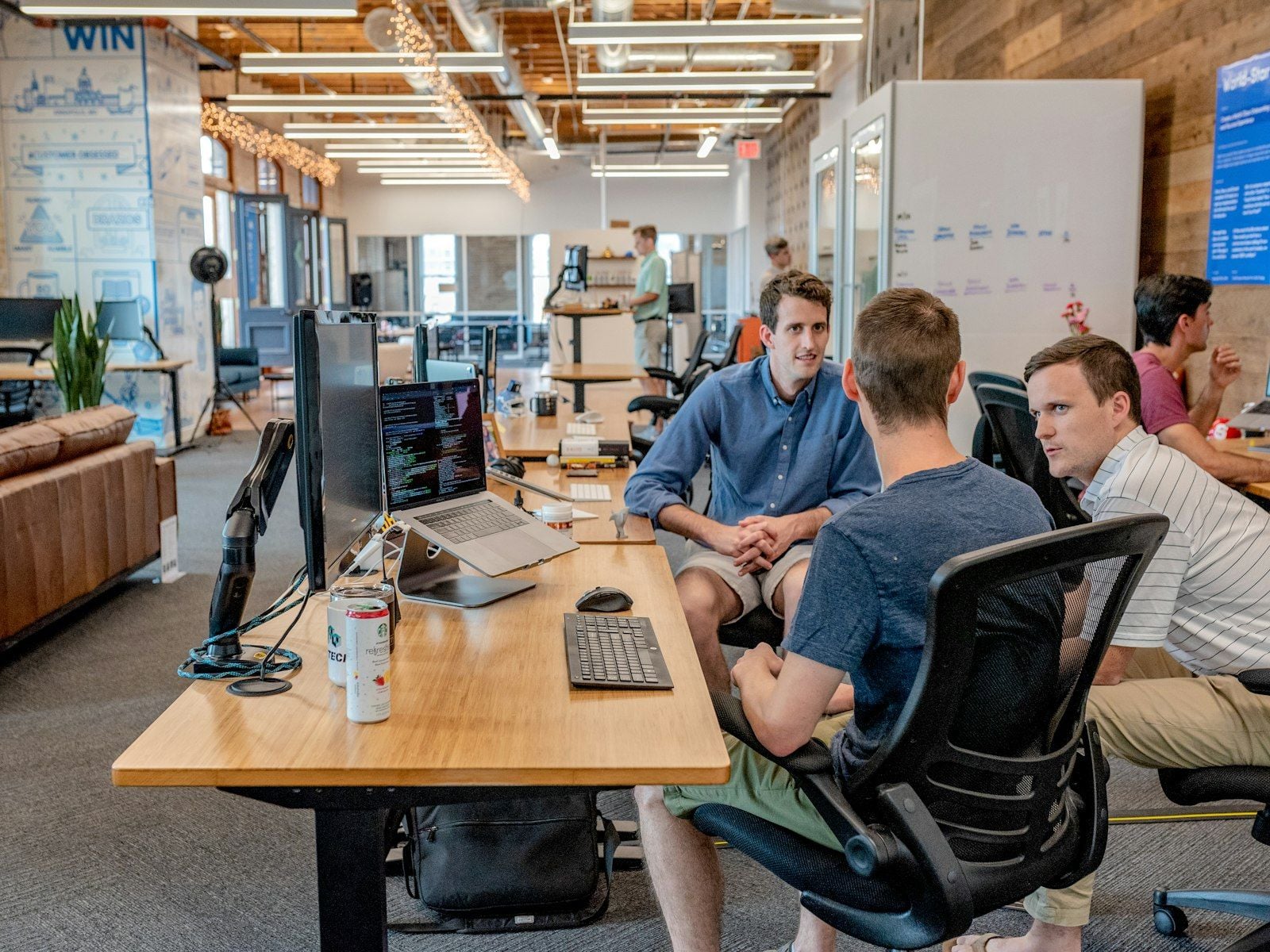 Team transcribing a Microsoft Teams meeting on a laptop